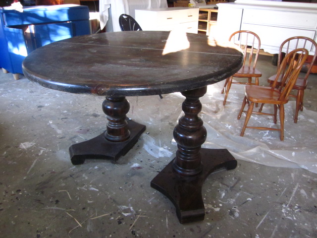 Oval dining table black stain