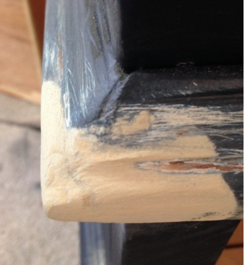 The third use for wood filler is to fill small holes after priming. Once the first coat of primer is painted on a piece of wood furniture, you will see small dents and dings in the wood that weren’t as visible prior. I always inspect a piece after it’s primed and fill the small holes.