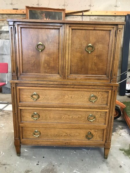 Dark stained tall chest
