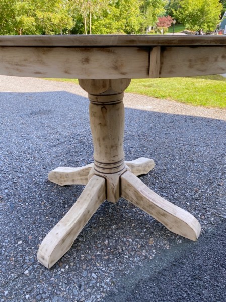 round natural pedestal table