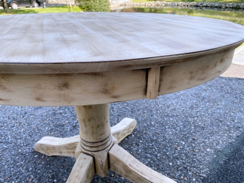 round natural pedestal table