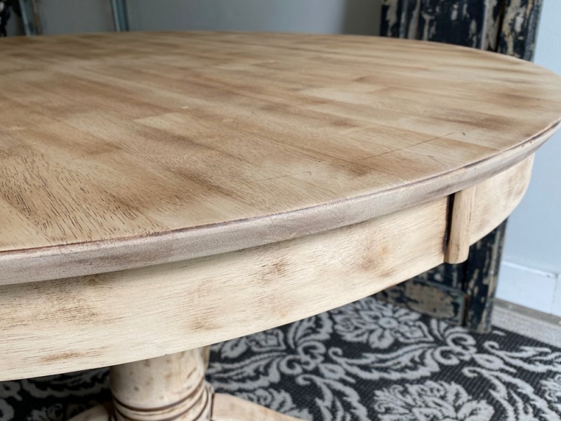 weathered natural round pedestal dining table