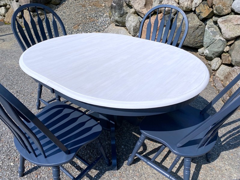 Whitewashed & navy blue oval dining table